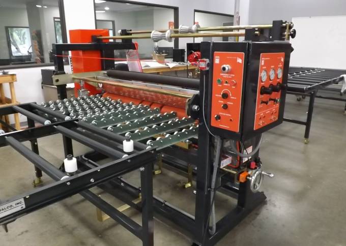 Industrial Laminator Walco 822 - wide shot of the complete in-line laminating system with entry and exit conveyor support