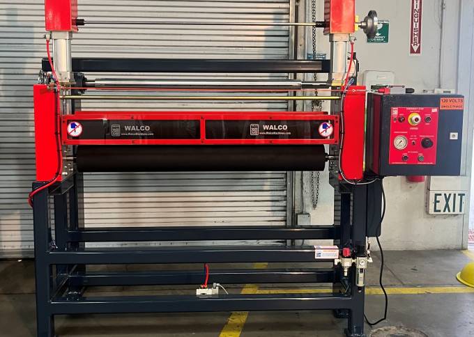 Industrial Laminator Walco 830 - direct front view showing the control box and roller assembly in an industrial workshop.