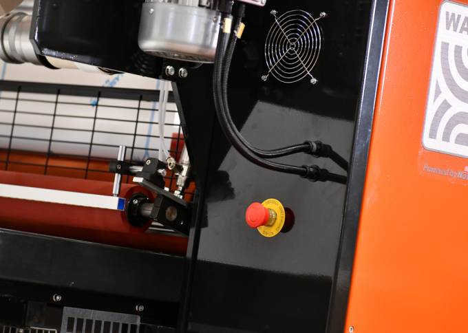 Industrial Laminator TX by Walco - close-up of the safety emergency stop button